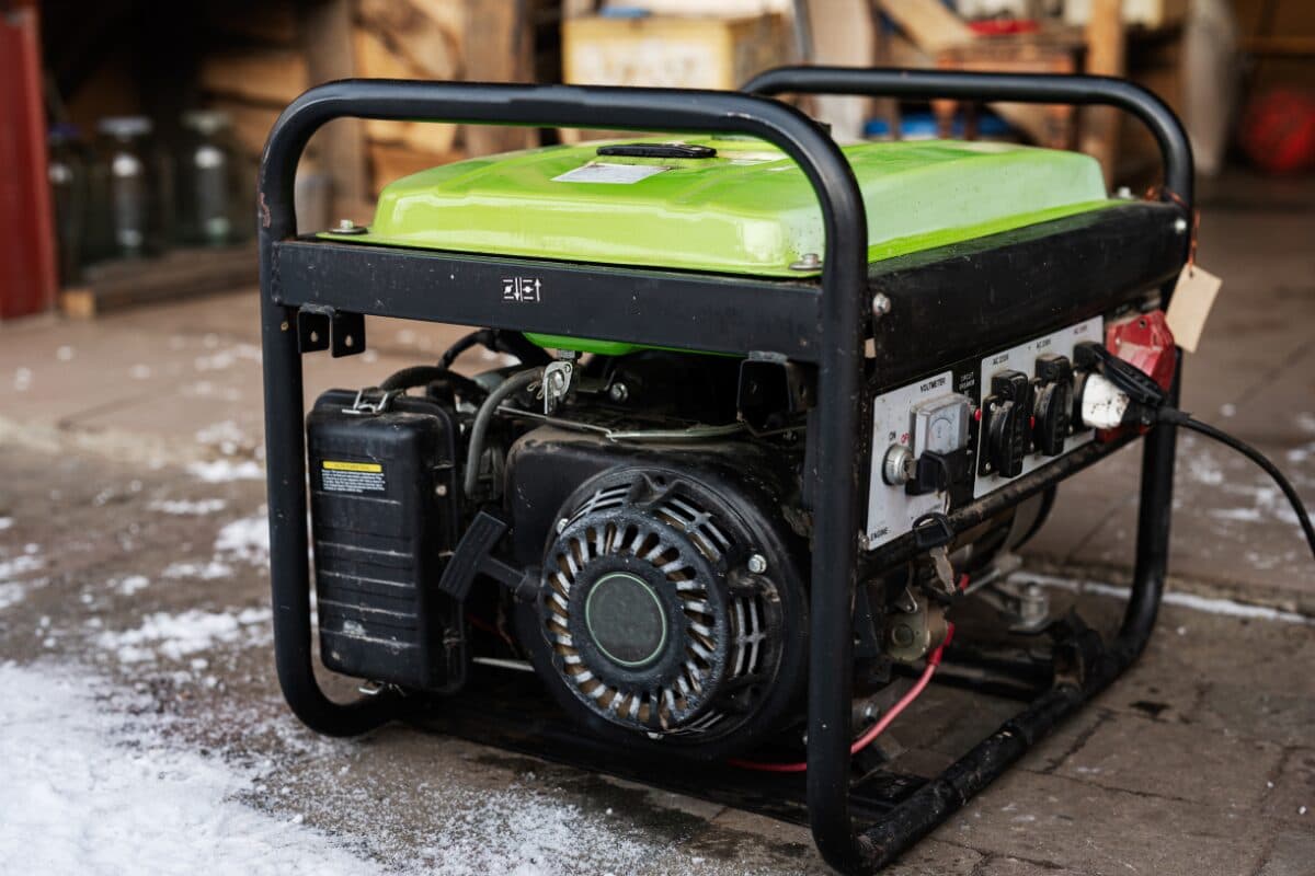 Portable generator connected to a home's power inlet to run a well pump.